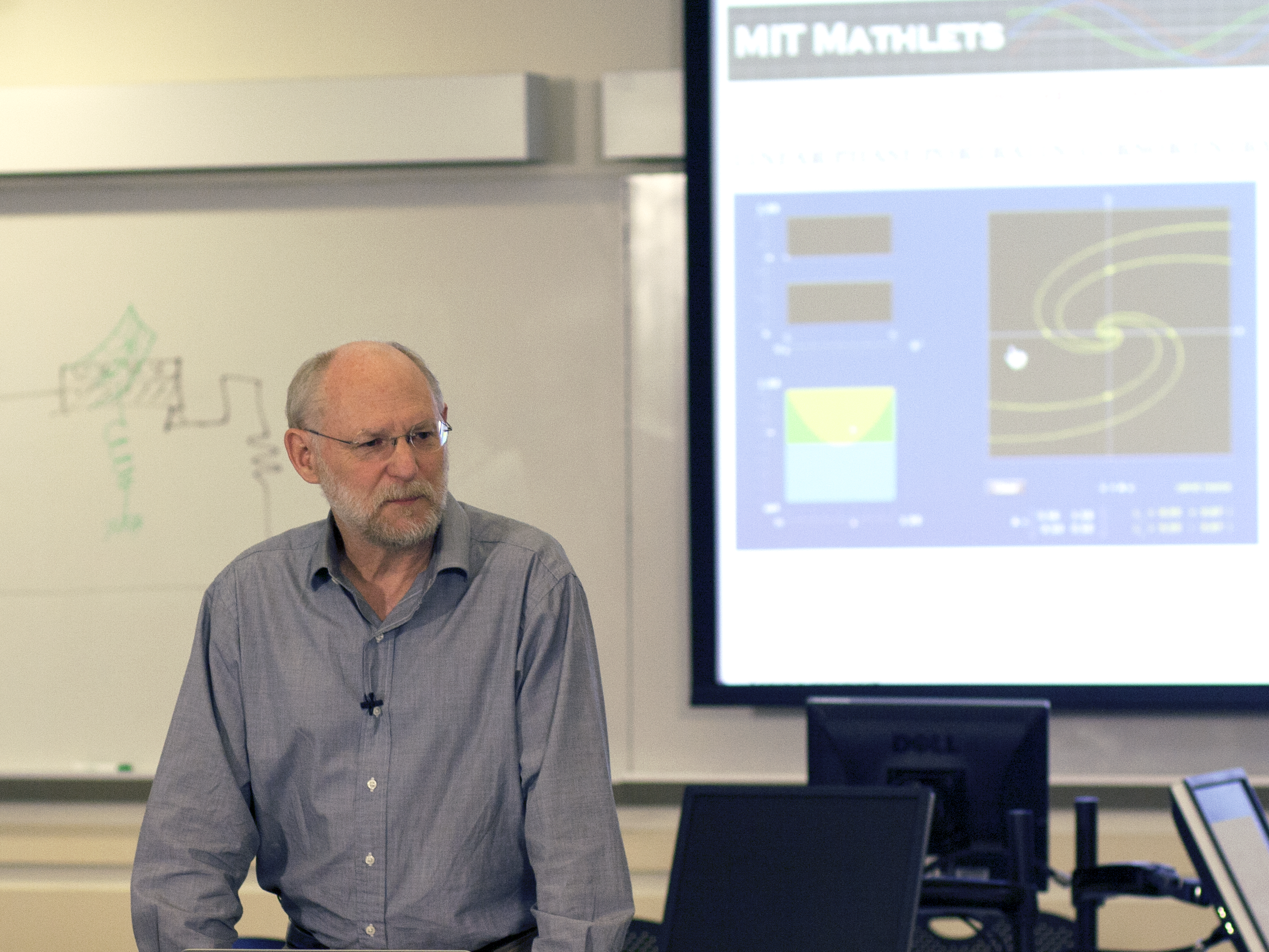 Photo of Haynes Miller lecturing with Mathlet in background